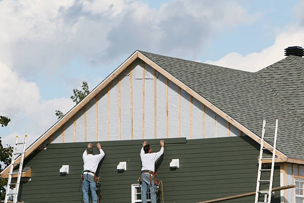 Professional Siding technician working in Germantown, MD